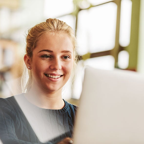 Young woman applying for a PCU college scholarship.