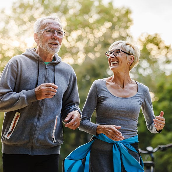 Happy couple after opening a money market savings account with PCU.