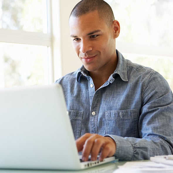 Man setting up a Certificate of Deposit CD savings account to grow his savings.