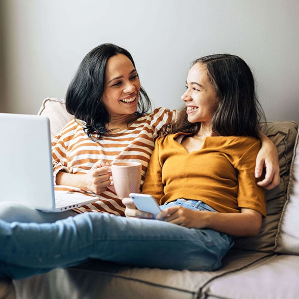 Teenager and mother discuss youth savings account at CCCU