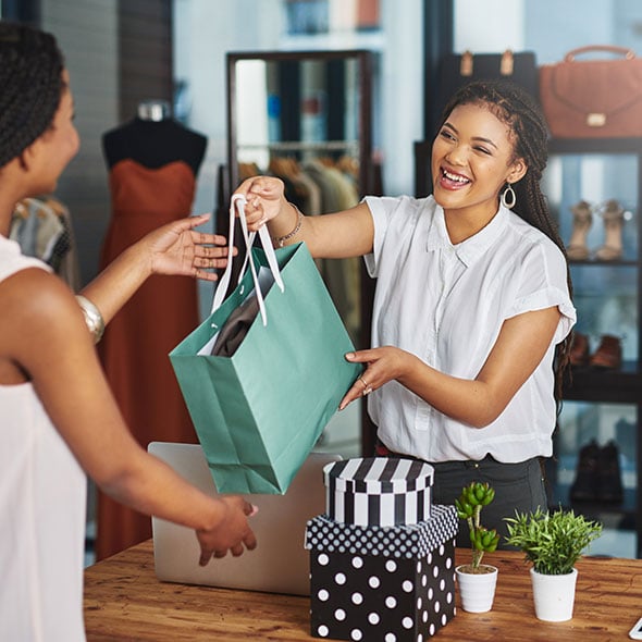 Shop owner uses a PCU business Credit Card to help her run her small business.